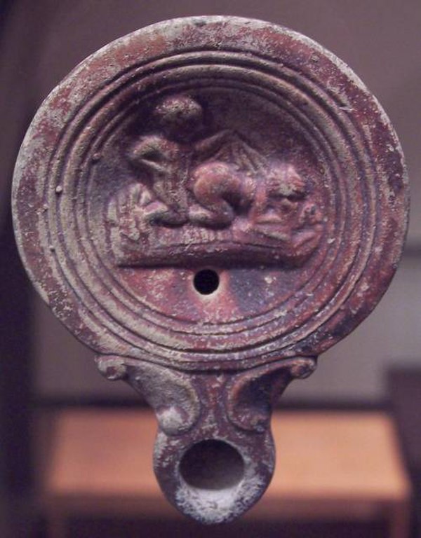 Roman oil lamp depicting sex