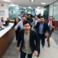 Sam Altman and colleagues running through OpenAI's offices in panic.